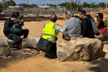 Filming of First Nations people having a yarn