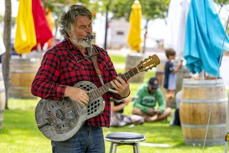Busker playing guitar