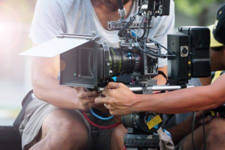 People using a camera to record 