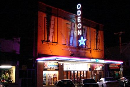 Cars in front of a local cinema