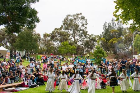 Group of dancers performing at outdoor event