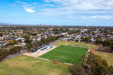 A drone image of a large sporting complex and ovals